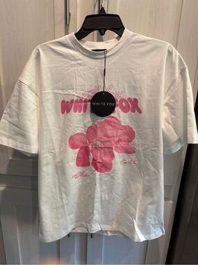 White Fox Boutique White Tee with Pink Floral Logo